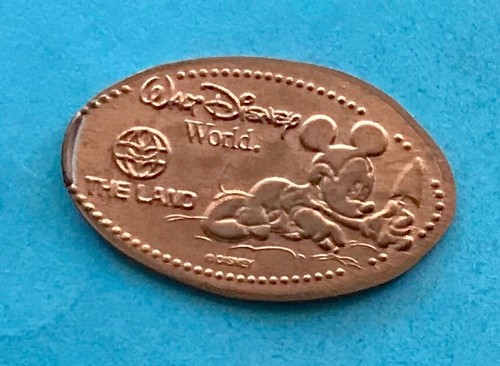 Mickey gardening the land - the,